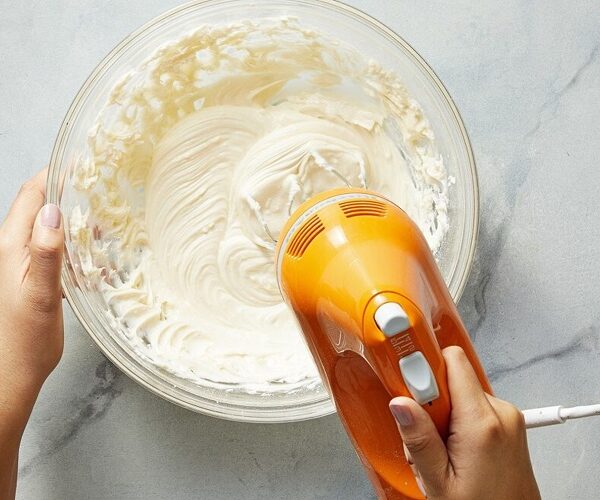 How Can Batter or Dough Residue Be Removed from a Hand Mixer