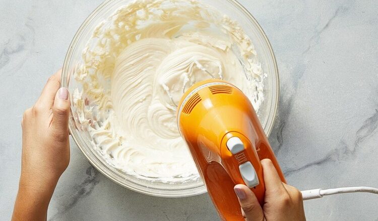 How Can Batter or Dough Residue Be Removed from a Hand Mixer