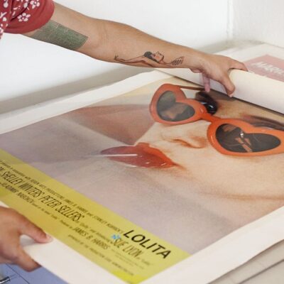 What Steps Are Involved in the Linen Backing Process for Posters